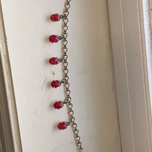 Elegant Gold and Strawberry Bracelet